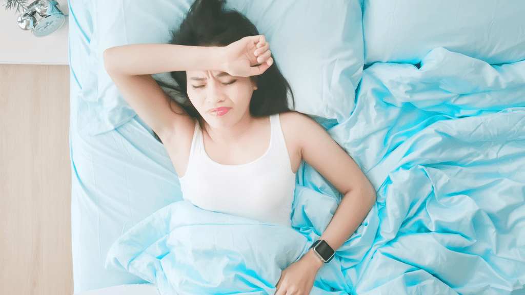 A women looking uncomfortable and feeling warm.