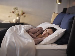 A lady sleeping on her side