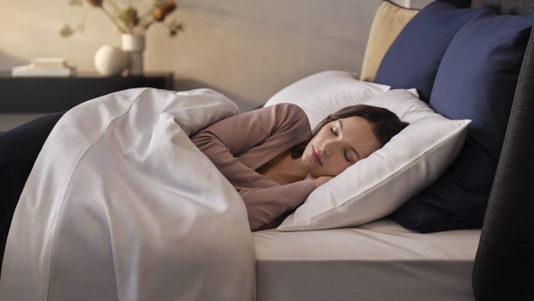A lady sleeping on her side