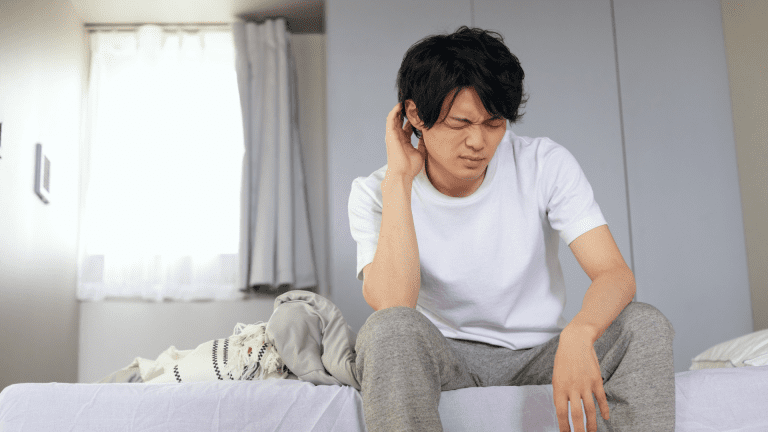 A man wakens due to him feeling uncomfortably warm in his mattress