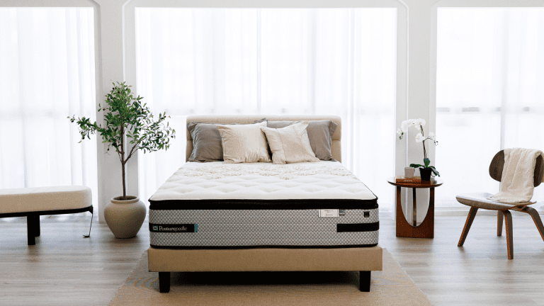 Brand new Sealy mattress in a bedroom